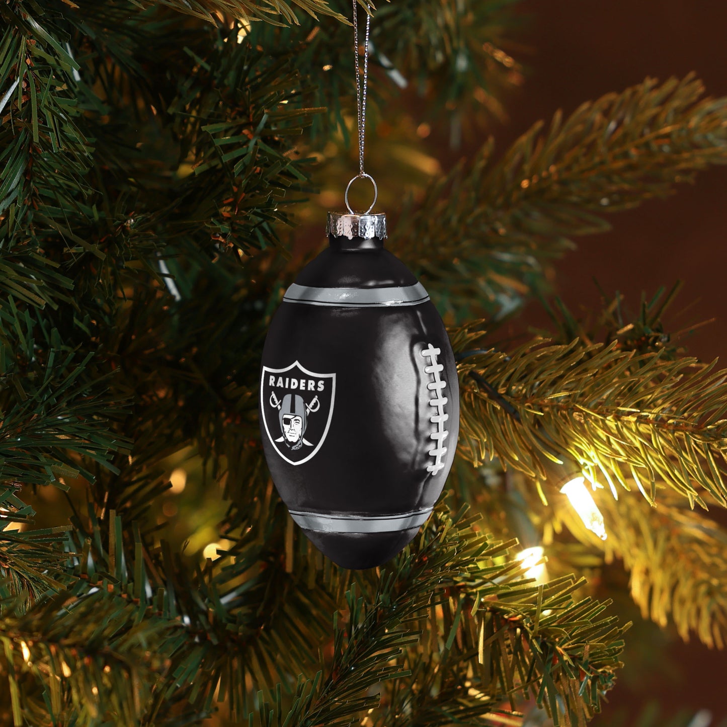 LAS VEGAS RAIDERS BLOWN GLASS FOOTBALL ORNAMENT